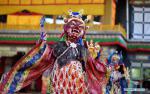 Sept.24,2020 -- A masked Buddhist monk performs an annual Cham dance event to pray for good harvest and peaceful life at the Tashilhunpo Monastery in Xigaze, southwest China`s Tibet Autonomous Region, Sept. 22, 2020. (Xinhua/Chogo)