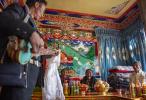 Jan.15,2021 -- A villager relocated from poverty-stricken area plays six-string guitar to celebrate farmers` New Year in his new house in Gajilin Village of Chaqiug Township in Sa`gya County of Xigaze, southwest China`s Tibet Autonomous Region, Jan. 14, 2021. (Xinhua/Sun Fei)