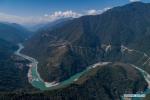 Feb. 18, 2021 -- Aerial photo taken on Feb. 13, 2021 shows the view of Yarlung Zangbo River in Medog County, Nyingchi City of southwest China`s Tibet Autonomous Region. (Xinhua/Sun Fei)