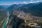 Feb. 18, 2021 -- Aerial photo taken on Feb. 13, 2021 shows the view of Yarlung Zangbo River and Medog County in Nyingchi City of southwest China`s Tibet Autonomous Region. (Xinhua/Sun Fei)