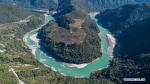Feb. 18, 2021 -- Aerial photo taken on Feb. 8, 2021 shows a curve of the Yarlung Zangbo River in Medog County, Nyingchi City of southwest China`s Tibet Autonomous Region. (Xinhua/Sun Fei)