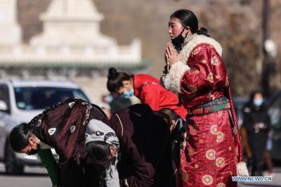 People of Tibetan ethnic group pray at Taer Monastery in Qinghai