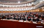 March 5,2021 -- Deputies to the 13th National People`s Congress (NPC) attend the opening meeting of the fourth session of the 13th NPC at the Great Hall of the People in Beijing, capital of China, March 5, 2021. (Xinhua/Ding Lin)