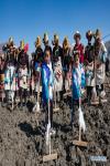 March 17,2021 -- People take part in a ceremony marking the start of spring ploughing in Shannan, southwest China`s Tibet Autonomous Region, March 16, 2021. (Xinhua/Jigme Dorje)