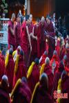 April 6,2021 -- Buddhist monks attend a debate activity, a part of the award ceremony of the degree of Geshe Lharampa held in the Jokhang Temple in Lhasa, capital of southwest China`s Tibet Autonomous Region, April 5, 2021. Thirteen Tibetan Buddhist monks from 13 temples across Tibet were awarded the degree of Geshe Lharampa on Monday. Geshe Lharampa is the highest academic degree for the Tibetan Buddhists, with a history of 400 years. (China News Service/Jiang Feibo)