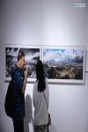 May 26,2021 -- Visitors view the exhibits during an exhibition celebrating the 70th anniversary of Tibet`s peaceful liberation at the Yanhuang Art Museum in Beijing, capital of China, May 21, 2021. An exhibition of art works and photographs opened in Beijing on Friday to celebrate the 70th anniversary of Tibet`s peaceful liberation. The show at the Yanhuang Art Museum consists of 86 fine images created in the 21st century, portraying Tibet`s scenery, people and culture. (Xinhua/Jin Liwang)