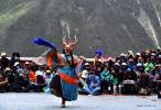 June 11,2021 -- A Buddhist monk performs Cham dance at the Drigung Monastery in Lhasa, southwest China`s Tibet Autonomous Region, June 9, 2021. Cham dance is a masked and costumed ritual performed by Tibetan Buddhist monks. (Xinhua/Chogo)