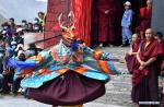 June 11,2021 -- A Buddhist monk performs Cham dance at the Drigung Monastery in Lhasa, southwest China`s Tibet Autonomous Region, June 9, 2021. Cham dance is a masked and costumed ritual performed by Tibetan Buddhist monks. (Xinhua/Chogo)