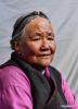 June 21,2021 -- Tseten Lhamo poses for a portrait in Qoide`og Village of Yardoi Township, Shannan City, southwest China`s Tibet Autonomous Region, June 3, 2021. Tseten Lhamo, 84, is a resident of Qoide`og Village of Yardoi Township. When recalling her life as a serf in the old days, Tseten Lhamo said she had to work for serf owners all year round, and could never have a rest even on holidays. During those days, the most unforgettable thing for Tseten Lhamo is paying rent. She had to rent farmland from serf owners and hand in heavy rent no matter the harvest was good or not. For Tseten Lhamo, who worked endlessly, even wearing new clothes and having a full meal was impossible. Tseten Lhamo was allocated with farmland, housing after the democratic reform in 1959, that she did not even dare to imagine in the past. (Xinhua/Jigme Dorje)