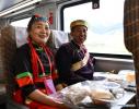 June 28,2021 -- Passengers aboard the Fuxing bullet train are pictured in Southwest China`s Tibet autonomous region, June 25, 2021. [Photo/Xinhua]
