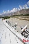 July 9,2021 -- Photo taken on June 30, 2021 shows the apron of the T3 terminal of Gonggar Airport in Lhasa, China`s Tibet Autonomous Region. The T3 terminal passed the final acceptance test on Wednesday, indicating the construction has been completed. (Photo/ China News service)