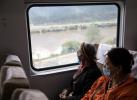 July 30,2021 -- Passenger Zhabsang (R) and her mother travel to Nyingchi by train in southwest China`s Tibet Autonomous Region, July 26, 2021. (Xinhua/Jin Liwang)