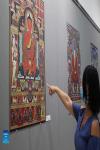 Aug.27,2021 -- A visitor enjoys the Tibetan Thangka artworks in Valletta, capital city of Malta, on Aug. 25, 2021. A Tibetan Thangka art exhibition, with the theme of `China`s Tibet, Tashi Delek,` opened in Malta on Friday to mark the 70th anniversary of Tibet`s peaceful liberation. (Xinhua/Chen Wenxian)