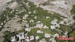 Aerial photo taken on Oct. 23, 2021 shows Tibetan-style houses in Dongba township, Southwest China`s Tibet Autonomous Region. (Photo: China News Service/Ran Wenjuan)