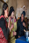 Tenzin Drolma (C) enjoys lunch with her parents in Gyaga Village of Damxung County, southwest China`s Tibet Autonomous Region, Jan. 18, 2022.