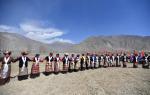 Villagers dance at a ceremony marking the start of spring farming in Carbanang village, Quxu county of Lhasa, Southwest China`s Tibet autonomous region, March 16, 2022. 