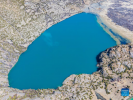 Aerial photo taken on April 2, 2022 shows the `white lake` of the `three-colored lakes` in Puyu Village of Banbar County, Qamdo, southwest China`s Tibet Autonomous Region.