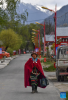 Yabao, 74, walks on a road in Namyi Lhoba Ethnic Township of Mainling County, southwest China`s Tibet Autonomous Region, April 12, 2022.