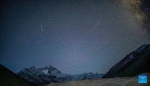 Photo taken on May 4, 2022 shows meteors above the Mount Qomolangma base camp. (Xinhua/Jiang Fan)