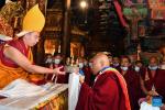 Panchen Erdeni Chos-kyi rGyal-po is greeted by a monk in the Jokhang Temple in Lhasa, capital city of southwest China`s Tibet Autonomous Region, on May 18, 2022. Panchen Erdeni Chos-kyi rGyal-po, a member of the Standing Committee of the National Committee of the Chinese People`s Political Consultative Conference, vice president of the Buddhist Association of China, and president of the association`s Tibet branch, on Wednesday attended religious activities in the Jokhang Temple in Lhasa. (Xinhua/Chogo)