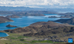 Photo taken on July 2, 2022 shows the scenery of the Yamdrok Lake in Nagarze County of Shannan City, southwest China`s Tibet Autonomous Region. (Xinhua/Sun Fei)