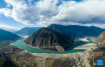 This stitched aerial photo taken on Dec. 18, 2022 shows the scenery of Mainling section of the Yarlung Zangbo River in Mainling County of Nyingchi, southwest China`s Tibet Autonomous Region. (Photo by Dong Zhixiong/Xinhua)