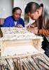 Lhaba Cering (L) instructs as an apprentice works on a woodcarving art craft piece in Lhasa, capital of southwest China`s Tibet Autonomous Region, April 25, 2023.(Xinhua/Jigme Dorje)
