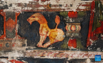 This photo taken on May 26, 2023 shows a lion in a mural in a grotto in Zanda County of Ngari Prefecture, southwest China`s Tibet Autonomous Region. 