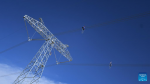 Workers conduct routing inspection of power transmission lines at Tanggulashan Township of Golmud City in the Mongolian-Tibetan Autonomous Prefecture of Haixi, northwest China`s Qinghai Province, June 3, 2023. 