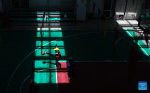 Pupils attend a basketball class at the indoor gym at a primary school of Zhaxizom Township in Tingri County, Xigaze City, southwest China`s Tibet Autonomous Region, June 5, 2023.