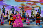 Artists perform at the opening ceremony of the 5th China Xizang Tourism and Culture Expo in Lhasa, capital of southwest China`s Tibet Autonomous Region, June 16, 2023. Nearly 1,000 businesses from home and abroad have brought about 10,000 kinds of products to the culture and tourism expo that opened Friday in Lhasa. (Xinhua/Zhang Rufeng)