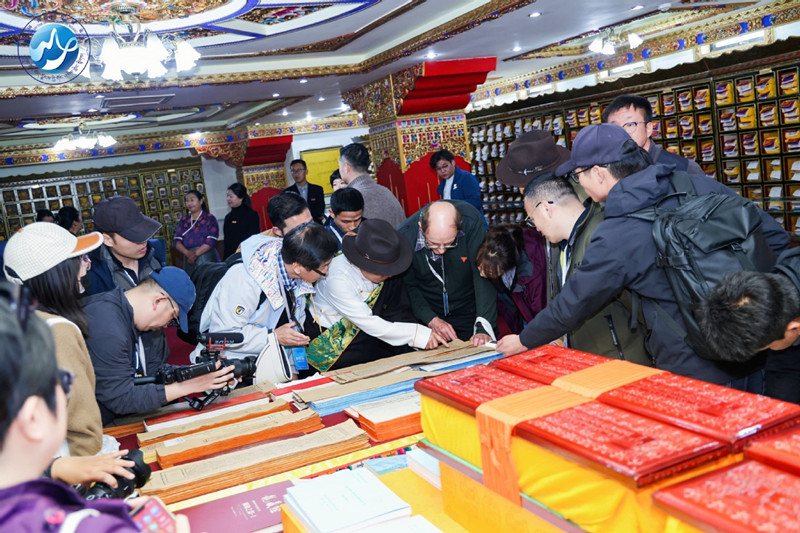 The materials include traditional ethnic Tibetan manuscripts. [Photo provided to China Daily]