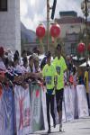 Participants compete in the Lhasa half-marathon on Sunday. [Photo by Dekyi Drolma/For chinadaily.com.cn]