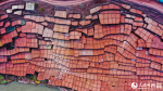 Aerial photo shows the stunning scenery of ancient salt pans in Naxi township, Mangkam county, Qamdo city, southwest China`s Xizang Autonomous Region. (People`s Daily Online/Tsering Norbu)