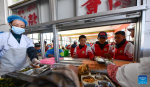 Students have lunch in a canteen at Damxung County Middle School in Damxung County, southwest China`s Xizang Autonomous Region, Nov. 10, 2023. (Xinhua/Jigme Dorje)