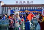 Attendees pose for a photo at the ceremony marking the opening of the Lijiang-Shangri-la railway in front of the Shangri-la railway station in Shangri-la, southwest China`s Yunnan Province, Nov. 26, 2023. (Xinhua/Chen Xinbo)