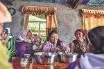 A family meal is a chance to get together. JIGME DORJE/XINHUA