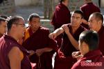 Buddhist monks participate in a scriptural debate, a unique way of learning in Tibetan Buddhism, at the Tashilhunpo Monastery in Xigaze, southwest China`s Tibet Autonomous Region, Dec. 4, 2023. (Photo: China News Service/Li Lin)