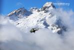 A helicopter attached to an army aviation brigade under the PLA Xizang Military Command flies in a mountainous area during the reconnaissance training in harsh environmental conditions on November 26, 2023. (eng.chinamil.com.cn/Photo by Hu Qiwu)