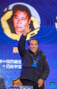 Samdrup, former expedition leader of China Xizang climbing team, waves to audience during a meeting for Mount Qomolangma guides in Lhasa, southwest China`s Xizang Autonomous Region, Dec. 11, 2023. A meeting for Mount Qomolangma guides was held in Lhasa on Monday. Experienced mountaineers shared their skills and stories to over 500 mountain guides, mountaineering enthusiasts and outdoor sports practitioners. (Xinhua/Jiang Fan)