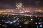 An aerial drone photo taken on Jan. 10, 2024 shows fireworks illuminating the sky on the `Gutu Eve` of farmers` New Year in Xigaze, southwest China`s Xizang Autonomous Region.(Photo by Tenzin Nyida/Xinhua)