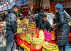 People visit and shop at a local market for the upcoming Chinese New Year in Lhasa, southwest China`s Xizang Autonomous Region, Feb. 6, 2024. (Xinhua/Sun Ruibo)