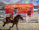 A rider performs riding and archery in Lhasa, southwest China`s Xizang Autonomous Region, Feb. 12, 2024. (Xinhua/Sun Ruibo)