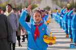 A young pioneer salutes at a flag-raising ceremony to celebrate the Serfs` Emancipation Day at the square in front of the Potala Palace in Lhasa, capital of southwest China`s Xizang Autonomous Region, March 28, 2024. On March 28, 1959, people in Xizang launched the democratic reform, freeing a million serfs. In 2009, the regional legislature announced March 28 as the day to commemorate the emancipation of the one million serfs. (Xinhua/Zhang Rufeng)