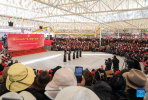 People watch a performance at a park to celebrate the Serfs` Emancipation Day in Lhasa, capital of southwest China`s Xizang Autonomous Region, March 28, 2024. On March 28, 1959, people in Xizang launched the democratic reform, freeing a million serfs. In 2009, the regional legislature announced March 28 as the day to commemorate the emancipation of the one million serfs. (Xinhua/Ding Ting)