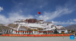 The national flag of China is seen on the square in front of the Potala Palace on the Serfs` Emancipation Day in Lhasa, capital of southwest China`s Xizang Autonomous Region, March 28, 2024. On March 28, 1959, people in Xizang launched the democratic reform, freeing a million serfs. In 2009, the regional legislature announced March 28 as the day to commemorate the emancipation of the one million serfs. (Xinhua/Jigme Dorje)