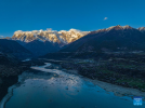 An aerial drone photo taken on April 1, 2024 in Suosong Village of Nyingchi, southwest China`s Xizang Autonomous Region, shows the scenery of Mount Namjagbarwa. (Xinhua/Sun Fei)