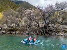 A team from Chengdu competes during the Basum Tso International Rafting Open in Nyingchi, southwest China`s Xizang Autonomous Region, April 21, 2024. (Xinhua/Sun Fei)
