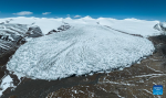 An aerial drone photo taken on May 11, 2024 shows a view of the Zangser Kangri Glacier at the Changtang National Nature Reserve, southwest China`s Xizang Autonomous Region. (Xinhua/Tenzin Nyida)