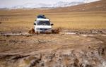 A ranger vehicle ploughs through muddy roads during patrol at the Changtang National Nature Reserve in Nyima County of southwest China`s Xizang Autonomous Region, May 10, 2024. (Xinhua/Jiang Fan)